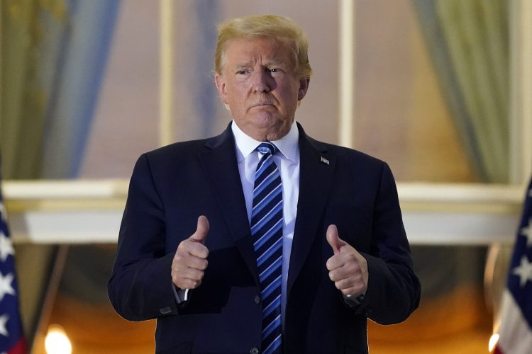Trump, Still Infectious, Back at White House — Without Mask